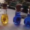 Spirit bottles! Tiny skull is handmade and will glow in the dark.